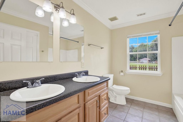 29 Joy Ln, Midway, GA 31320 - full bath with double vanity, crown molding, toilet, tile patterned flooring, and baseboards
