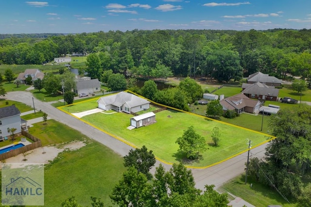 29 Joy Ln, Midway, GA 31320 - aerial view of residential area with property boundaries highlighted and a heavily wooded area