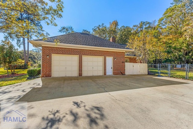 view of home's exterior with a garage