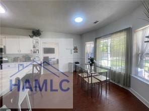 485 Cody Dr, Jesup, GA 31545 - dining room featuring dark wood finished floors and recessed lighting