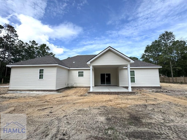 193W Melody Dr, Jesup, GA 31545 - rear view of property featuring a patio area and roof with shingles