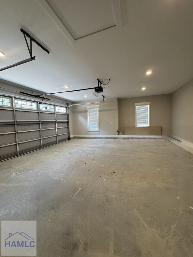 193W Melody Dr, Jesup, GA 31545 - garage featuring a garage door opener and recessed lighting