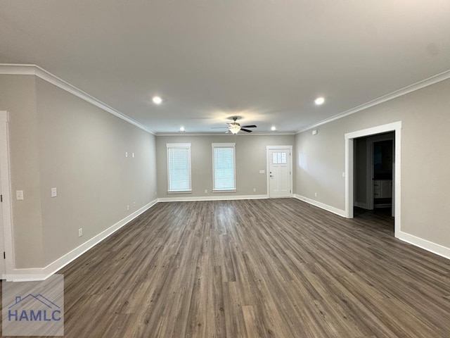 193W Melody Dr, Jesup, GA 31545 - unfurnished living room with a ceiling fan, healthy amount of natural light, dark wood-style flooring, recessed lighting, and crown molding