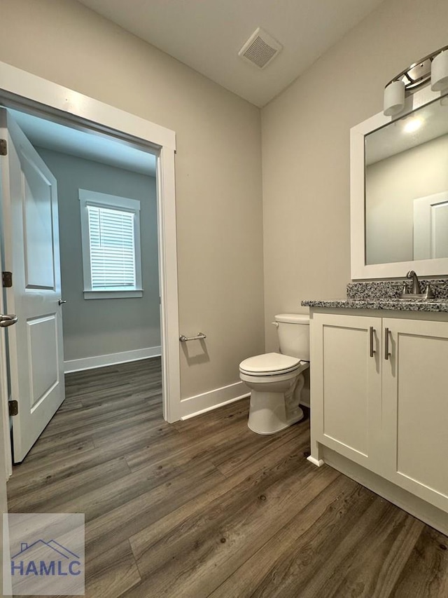 193W Melody Dr, Jesup, GA 31545 - bathroom with vanity and wood finished floors