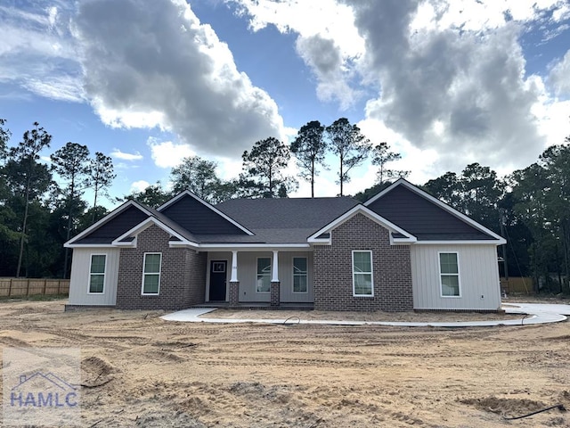 193W Melody Dr, Jesup, GA 31545 - view of front facade with brick siding and a porch