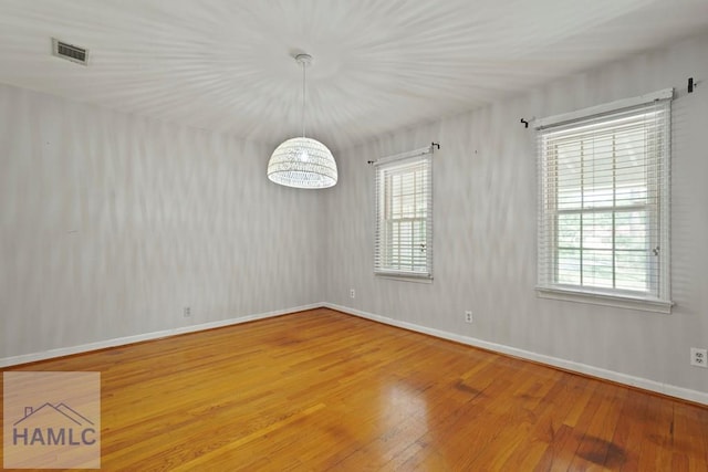 265 Mahan St, Jesup, GA 31545 - unfurnished dining area with hardwood / wood-style floors