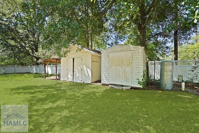265 Mahan St, Jesup, GA 31545 - view of shed with a fenced backyard