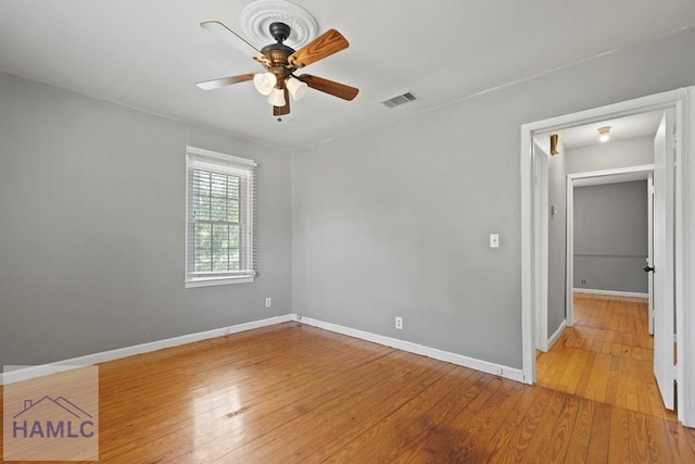 265 Mahan St, Jesup, GA 31545 - unfurnished room featuring a ceiling fan and light wood finished floors