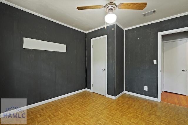 265 Mahan St, Jesup, GA 31545 - unfurnished bedroom featuring baseboards and ceiling fan