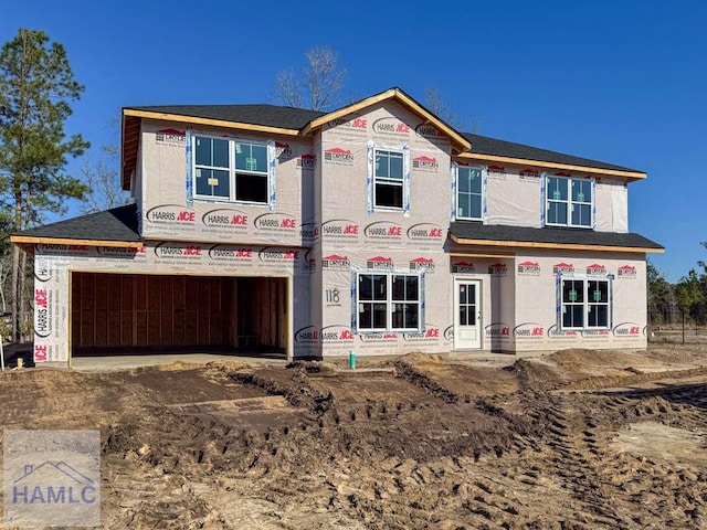 property under construction with a garage