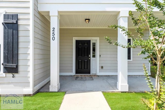 entrance to property with a porch