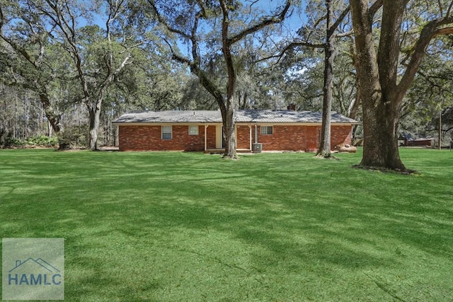 view of yard featuring central AC