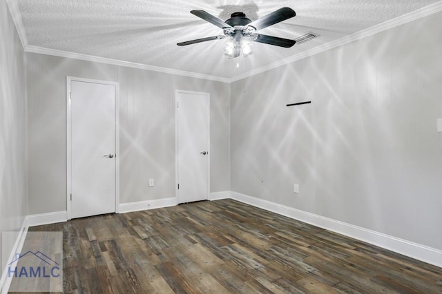 spare room featuring visible vents, ceiling fan, ornamental molding, hardwood / wood-style flooring, and a textured ceiling