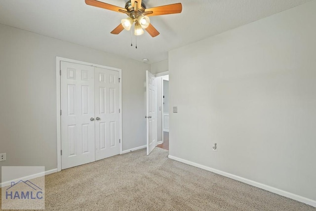 138 Forest St NE, Ludowici, GA 31316 - unfurnished bedroom with carpet floors, a closet, and ceiling fan
