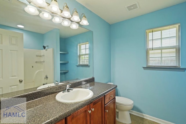 138 Forest St NE, Ludowici, GA 31316 - bathroom featuring vanity, tile patterned flooring, and shower / tub combination