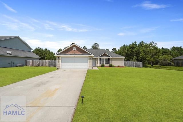 138 Forest St NE, Ludowici, GA 31316 - view of front of home with concrete driveway and an attached garage