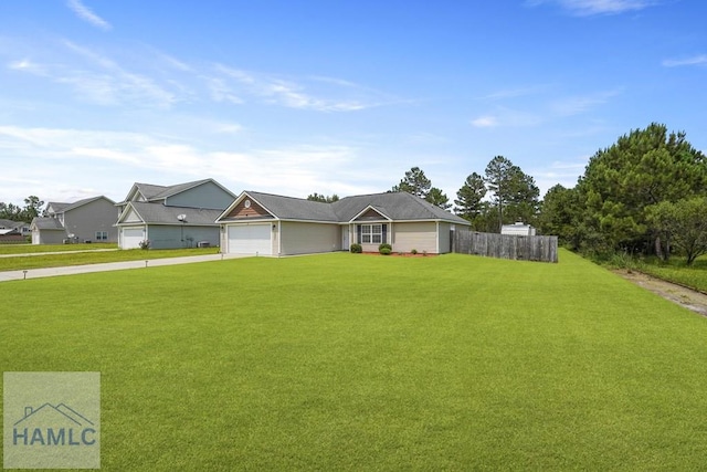138 Forest St NE, Ludowici, GA 31316 - ranch-style house featuring concrete driveway and a garage