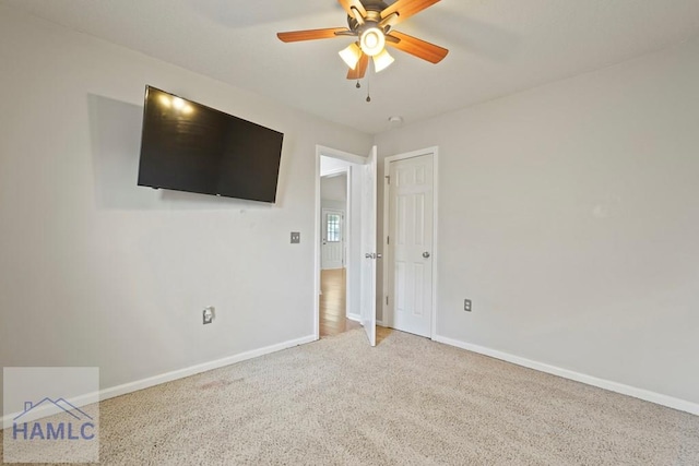 138 Forest St NE, Ludowici, GA 31316 - unfurnished bedroom with carpet flooring and a ceiling fan