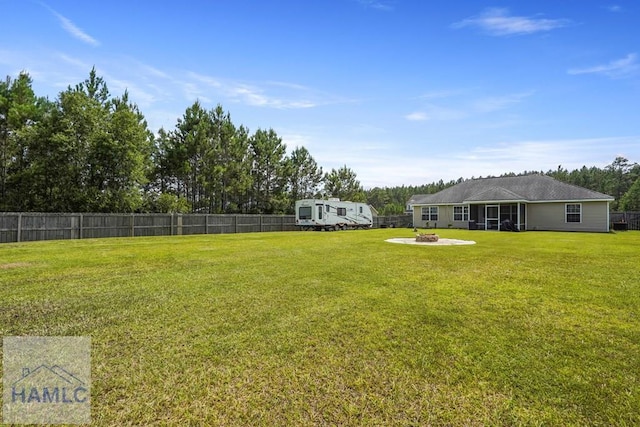 138 Forest St NE, Ludowici, GA 31316 - view of yard featuring a fire pit