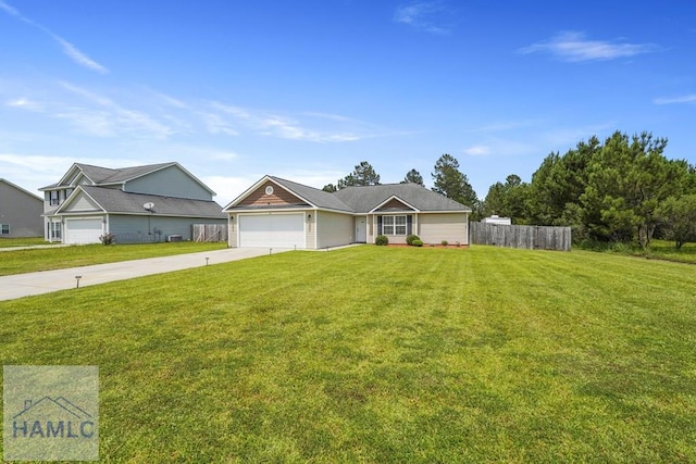 138 Forest St NE, Ludowici, GA 31316 - ranch-style home featuring concrete driveway and an attached garage