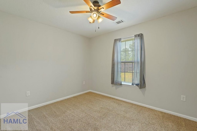 138 Forest St NE, Ludowici, GA 31316 - empty room with carpet and ceiling fan