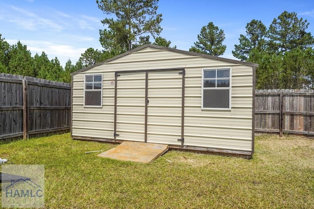 138 Forest St NE, Ludowici, GA 31316 - view of shed featuring a fenced backyard
