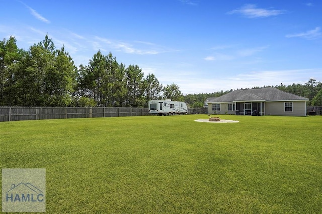 138 Forest St NE, Ludowici, GA 31316 - view of yard with a fire pit