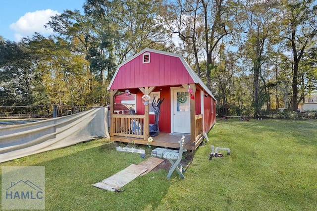 view of outbuilding with a lawn