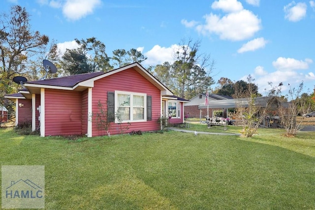 exterior space with a front yard