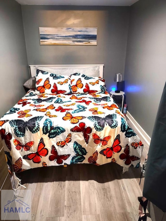 bedroom featuring light wood-type flooring