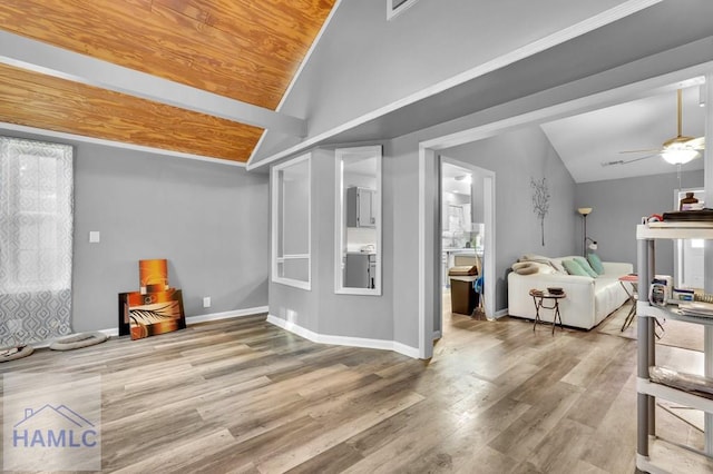 living room featuring light hardwood / wood-style flooring, ceiling fan, and lofted ceiling