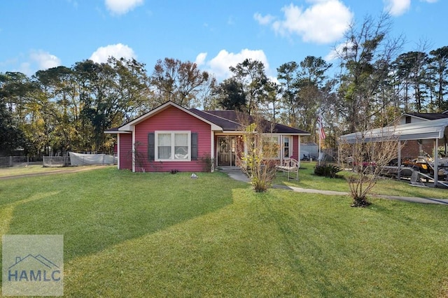 ranch-style home featuring a front yard