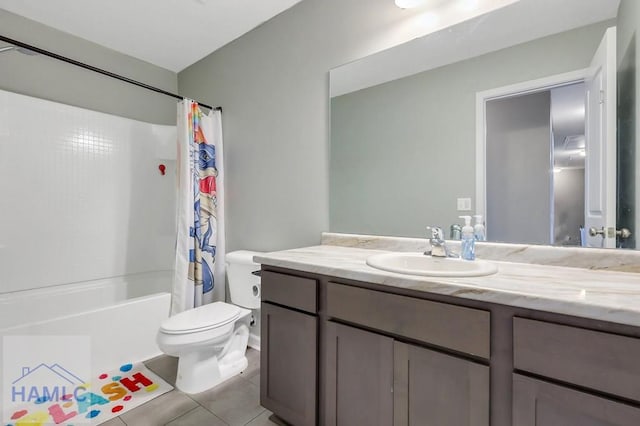 bathroom featuring shower / bath combo, tile patterned flooring, vanity, and toilet