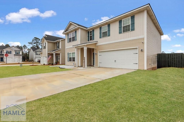 view of front facade with fence, a front lawn, concrete driveway, an attached garage, and board and batten siding