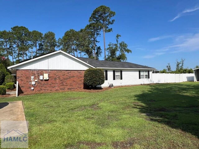3520 Waycross Hwy, Jesup, GA 31545 - view of side of home featuring brick siding and board and batten siding