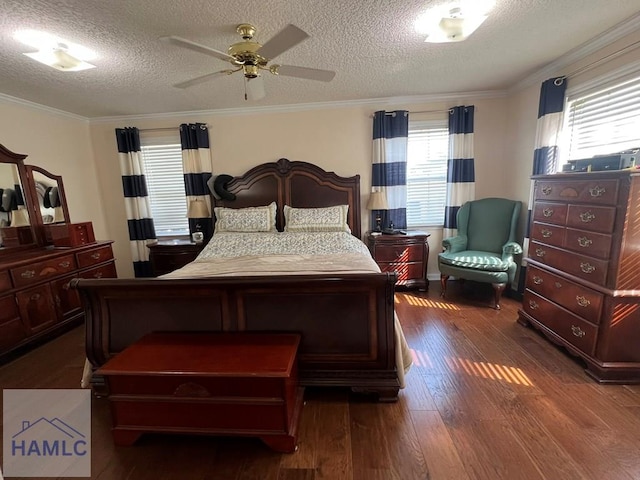 3520 Waycross Hwy, Jesup, GA 31545 - bedroom featuring multiple windows, dark wood-type flooring, ornamental molding, a textured ceiling, and a ceiling fan