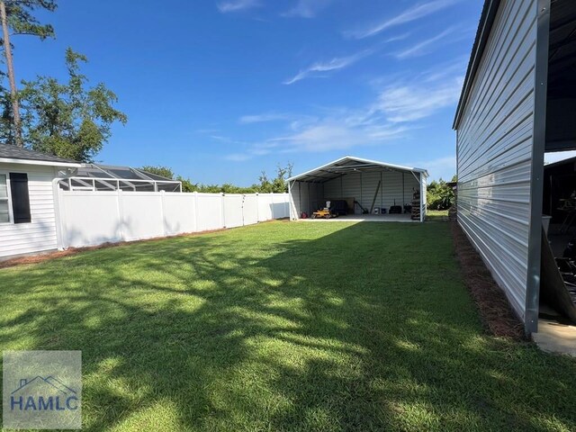 3520 Waycross Hwy, Jesup, GA 31545 - view of yard with a carport