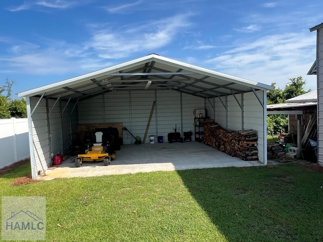 3520 Waycross Hwy, Jesup, GA 31545 - view of outdoor structure featuring a detached carport and driveway
