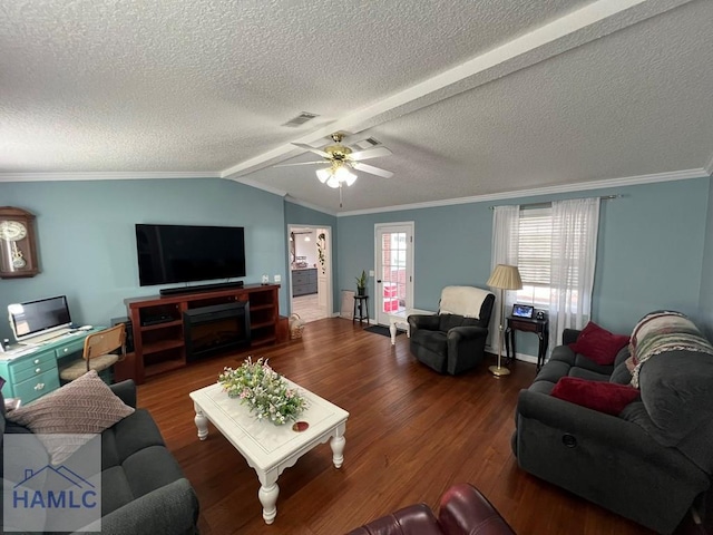 3520 Waycross Hwy, Jesup, GA 31545 - living area with wood finished floors, ceiling fan, ornamental molding, a textured ceiling, and lofted ceiling