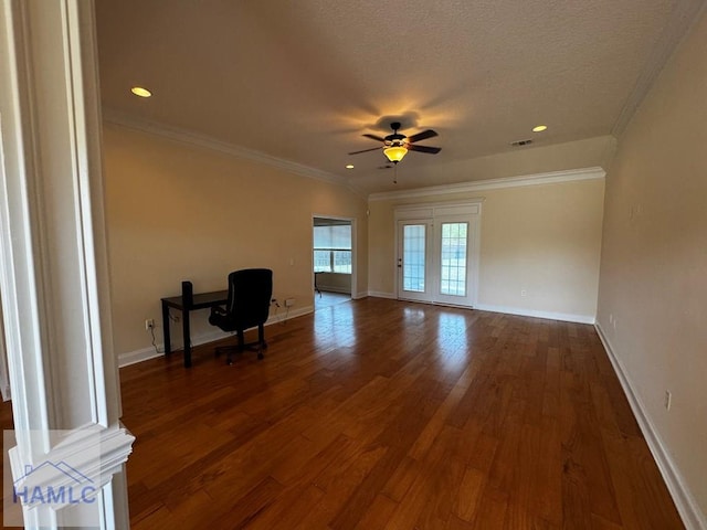 interior space with baseboards, ceiling fan, and wood finished floors