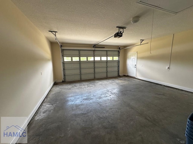 garage with baseboards and a garage door opener