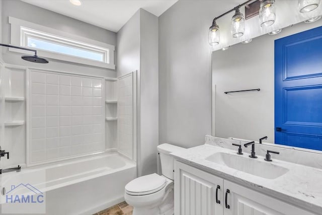 full bath with toilet, vanity, and bathtub / shower combination