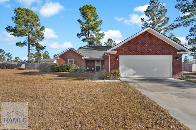 ranch-style home featuring a garage