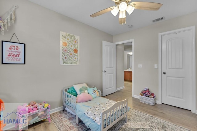 bedroom featuring ceiling fan and light hardwood / wood-style floors