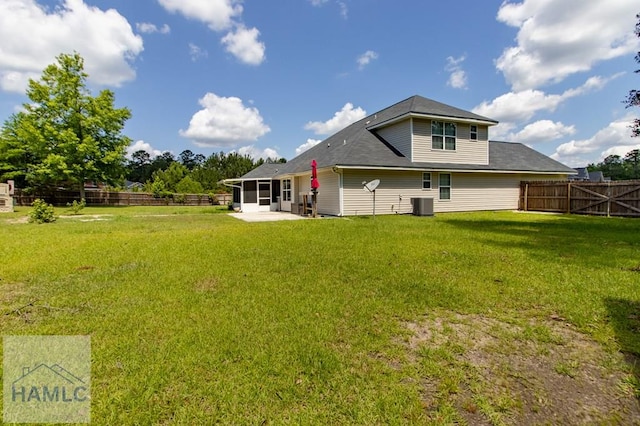 rear view of house featuring a patio area and central air condition unit