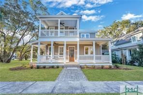 view of front of house featuring a porch and a front yard