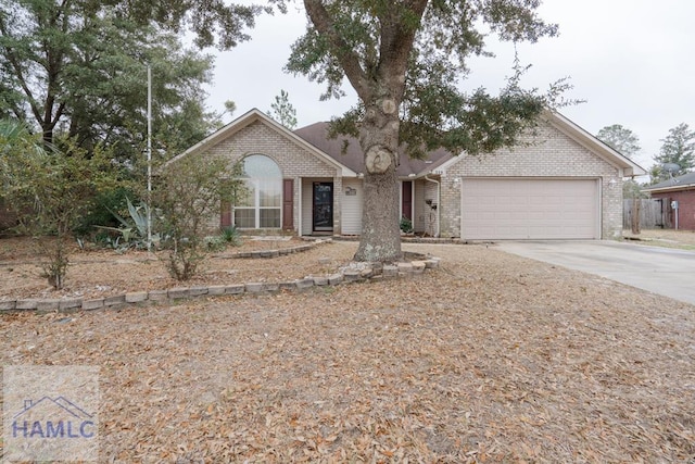 ranch-style house featuring a garage