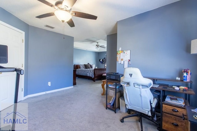 office space with ceiling fan and carpet flooring