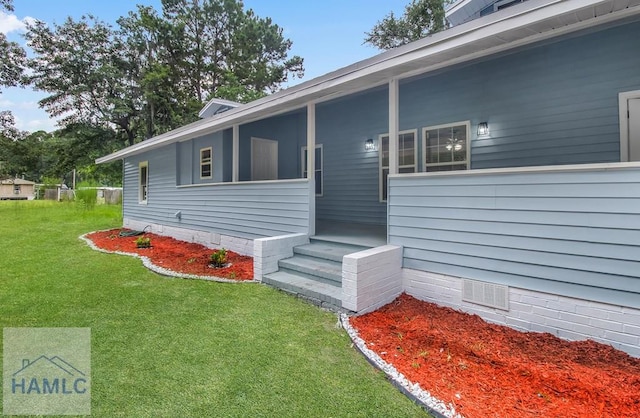 123 2nd Ave, Midway, GA 31313 - view of side of home with a yard