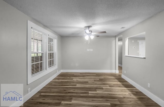 123 2nd Ave, Midway, GA 31313 - spare room with ceiling fan, a textured ceiling, and dark wood-style floors